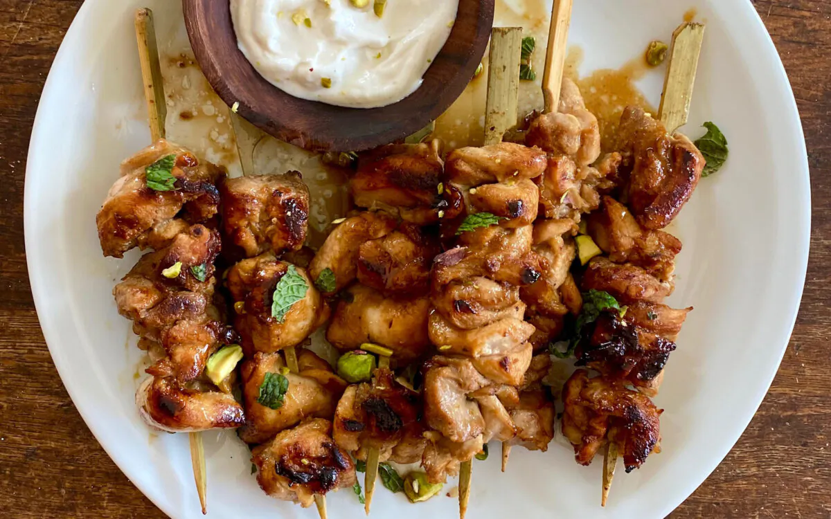 Pomegranate molasses adds puckery brightness to the marinade for these grilled chicken skewers. (Lynda Balslev for Tastefood)