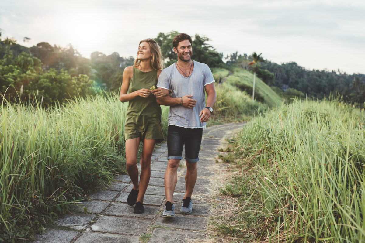 A brisk stroll after dinner can manage post-meal blood sugar spikes and lower one's risk of Type 2 diabetes. (Jacob Lund/Shutterstock)