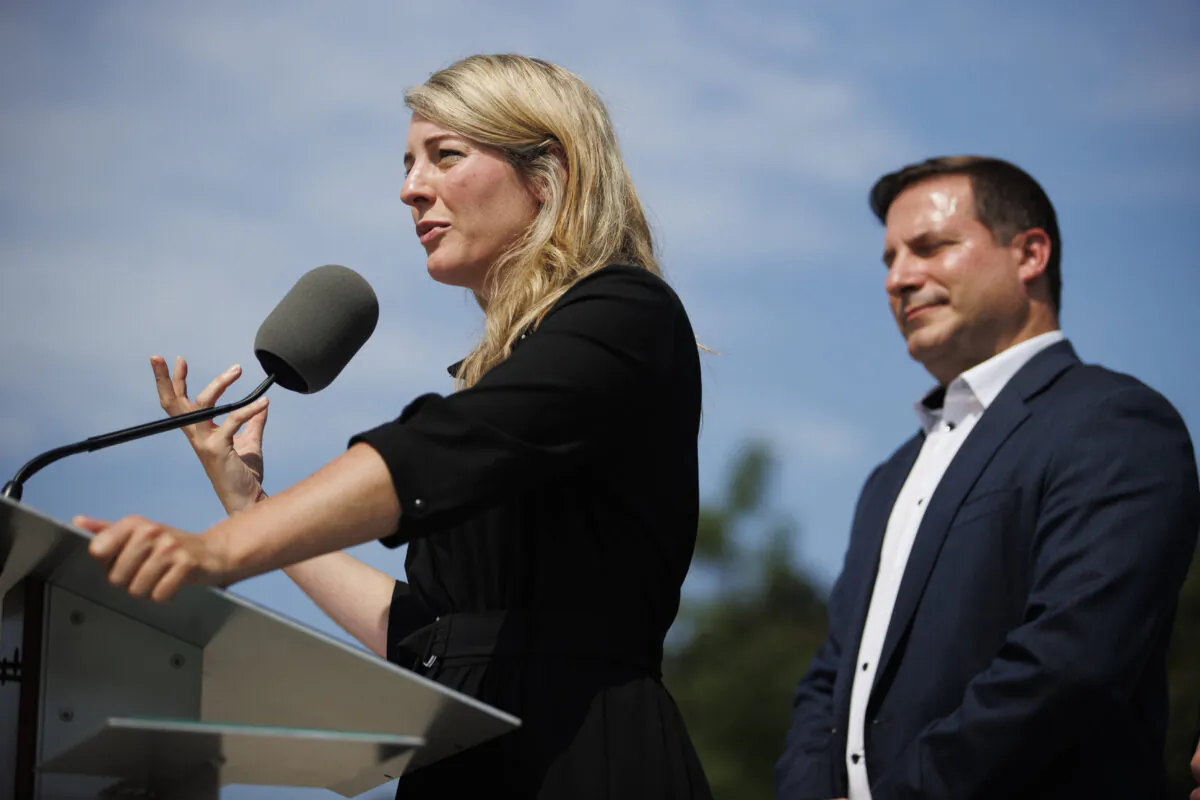 Minister of Foreign Affairs Melanie Joly speaks alongside the minister of Public Safety, Marco Mendicino, during a press conference announcing new gun control laws, in Toronto, Friday, Aug. 5, 2022. THE CANADIAN PRESS/Cole Burston