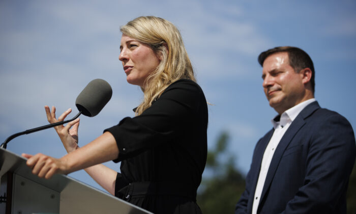 Minister of Foreign Affairs Melanie Joly speaks alongside the minister of Public Safety, Marco Mendicino, during a press conference announcing new gun control laws, in Toronto, Friday, Aug. 5, 2022. THE CANADIAN PRESS/Cole Burston