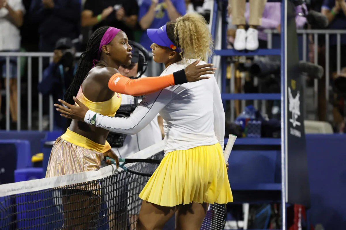 Coco Gauff, left, of the United States, and Naomi Osaka, of Japan, meet at the net after Gauff's win at the Mubadala Silicon Valley Classic tennis tournament in San Jose, Calif., Thursday, Aug. 4, 2022.(Santiago Mejia/AP Photo)