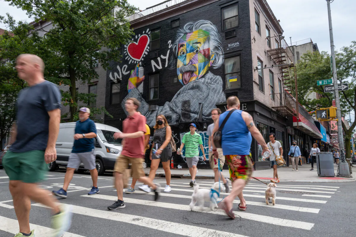 People walk through the Chelsea neighborhood in Manhattan, the heart of New York's LGBT community in New York City, on July 29, 2022. (Spencer Platt/Getty Images)
