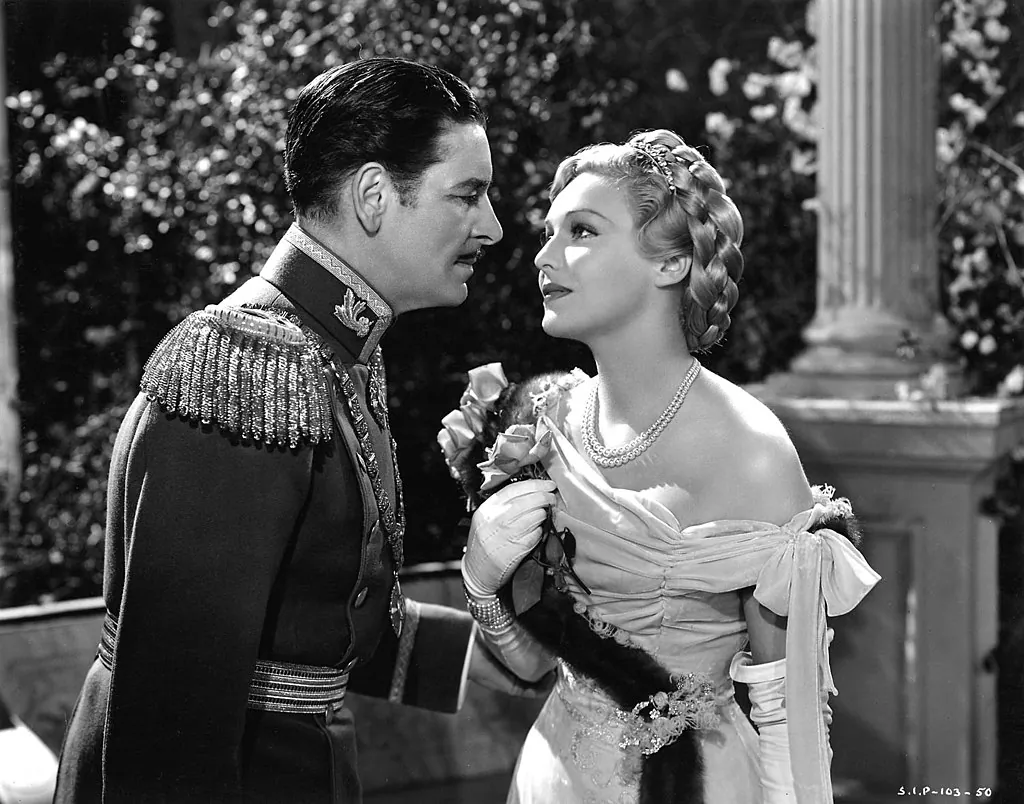 Ronald Colman as Rudolf Rassendyll and Madeleine Carroll as Princess Flavia in 1937 movie "The Prisoner of Zenda." Selznick International Pictures. (Public Domain)
