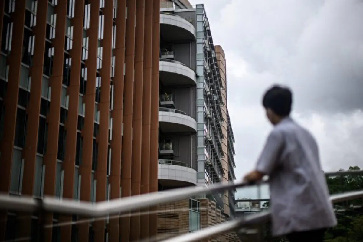 An 18-year-old high school student who was injured in the 2019 anti-extradition movement was standing outside a university in Hong Kong on June 2, 2020. (Anthony Wallace/AFP/Getty Images)