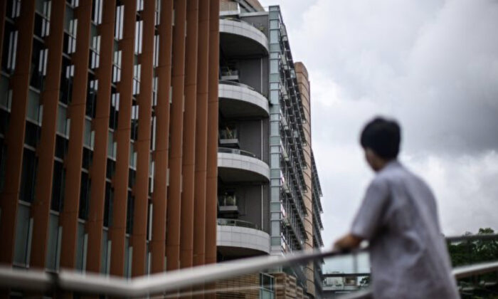 An 18-year-old high school student who was injured in the 2019 anti-extradition movement was standing outside a university in Hong Kong on June 2, 2020. (Anthony Wallace/AFP/Getty Images)