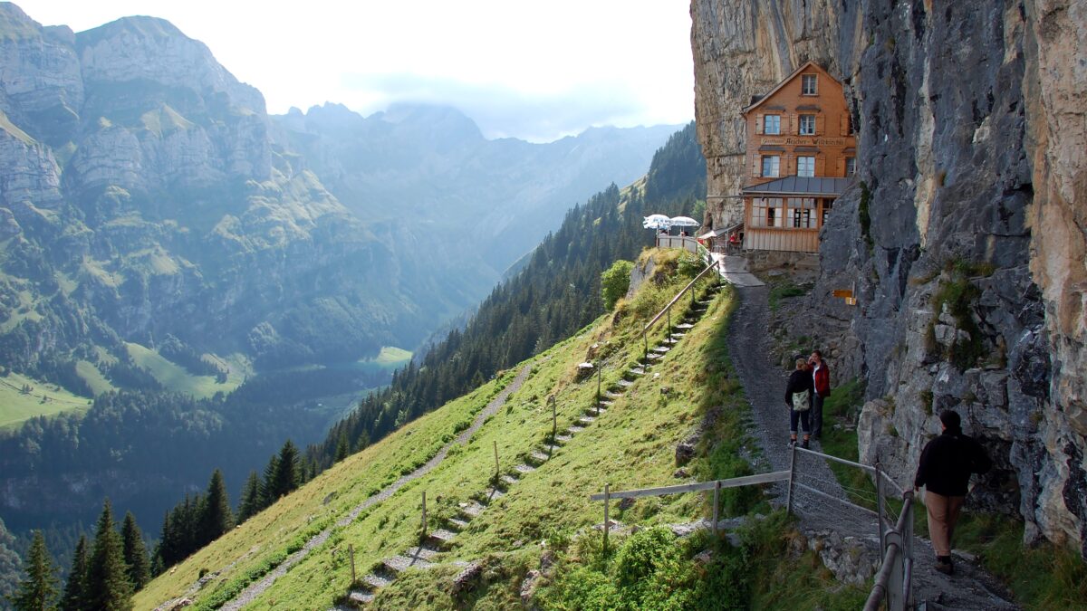 At Switzerland's Ebenalp, you can stay in this cliff-side guesthouse and enjoy stunning mountain scenery. (Cameron Hewitt, Rick Steves' Europe)