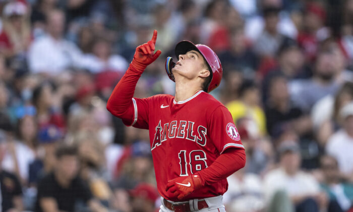 Los Angeles Angels' Mickey Moniak celebrates after hitting a solo home run off Seattle Mariners starting pitcher Chris Flexen during the fourth inning of the second game of a baseball doubleheader in Seattle, Saturday, Aug. 6, 2022. (Stephen Brashear/AP Photo)
