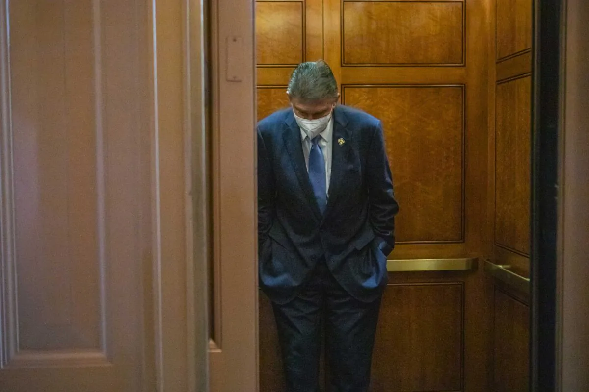 Sen. Joe Manchin (D-W.Va.) departs the Senate floor following a vote on Capitol Hill in Washington on Aug. 6, 2022. (Anna Rose Layden/Getty Images)