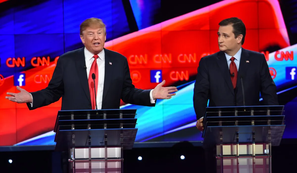 (L-R) Donald Trump, who was then a Republican presidential candidate, gestures as Texas Sen. Ted Cruz looks on during the Republican Presidential Debate, hosted by CNN, at The Venetian Las Vegas, in Las Vegas, Nevada, on Dec. 15, 2015. (Robyn Beck/AFP via Getty Images)