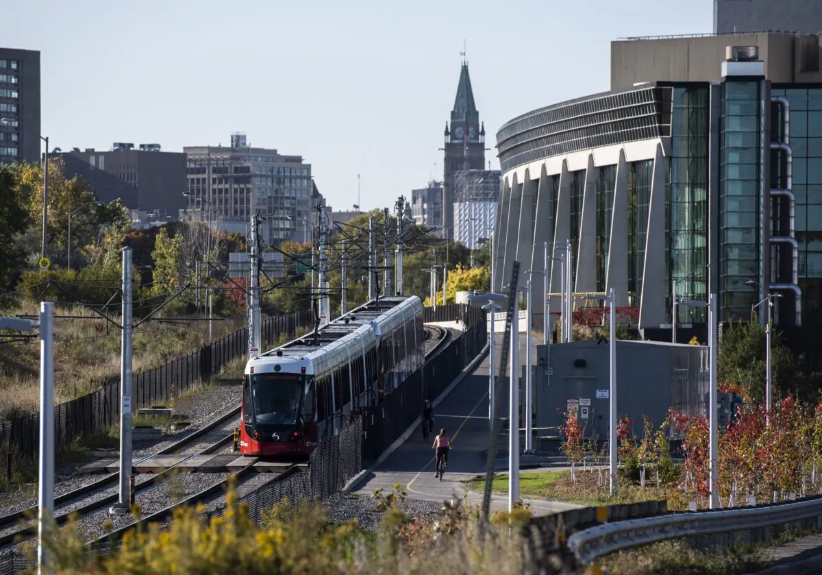 An LRT train on OC Transpo's new O-Train Confederation Line departs Lees Station in Ottawa on Oct. 11, 2019. (The Canadian Press/Justin Tang)