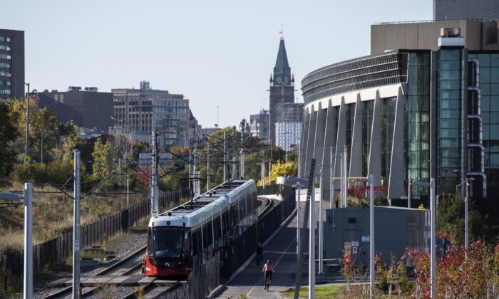 An LRT train on OC Transpo's new O-Train Confederation Line departs Lees Station in Ottawa on Oct. 11, 2019. (The Canadian Press/Justin Tang)

