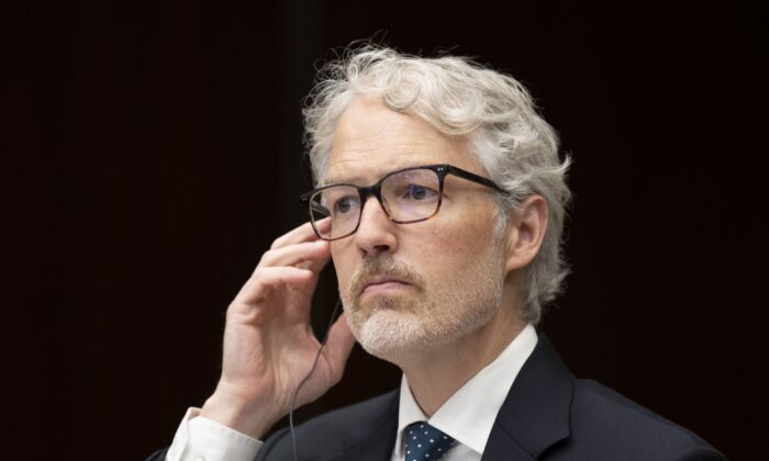 Privacy Commissioner of Canada Philippe Dufresne waits to appear before the Standing Committee on Access to Information, Privacy and Ethics in Ottawa on Aug. 8, 2022. (Adrian Wyld/The Canadian Press)