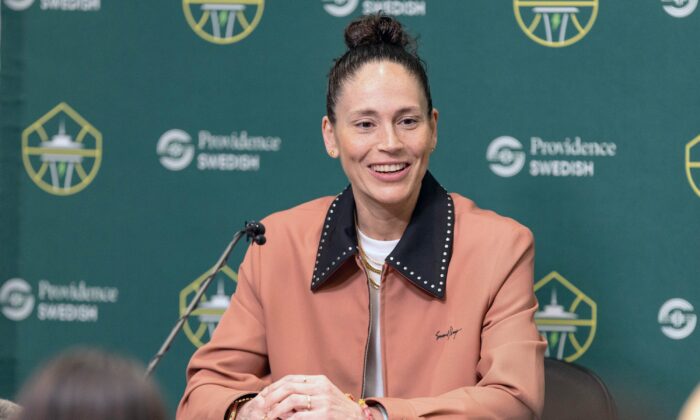 Sue Bird talks to reporters during a news conference at Climate Pledge Arena in Seattle on Aug. 7, 2022. (Dean Rutz/The Seattle Times via AP)