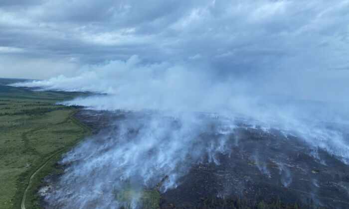Smoke from a forest fire in central Newfoundland is shown in a Aug.7, 2022 government handout photo. (The Canadian Press/HO/Government of Newfoundland and Labrador)