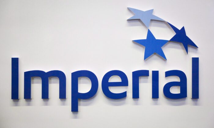 Imperial Oil logo at the company's annual meeting in Calgary on April 28, 2017. (The Canadian Press/Jeff McIntosh)