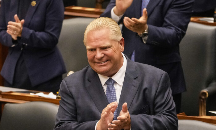Ontario Premier Doug Ford applauds as  Lt.-Gov. Elizabeth Dowdeswell delivers her Speech from the Throne at Queen's Park in Toronto on  Aug. 9, 2022. (THE CANADIAN PRESS/Andrew Lahodynskyj)