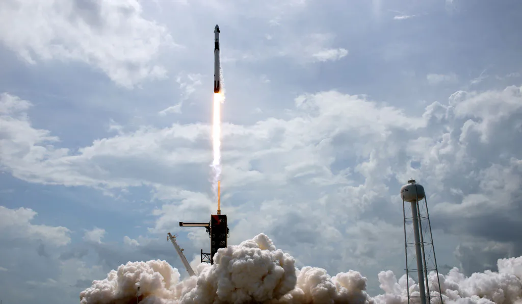 A SpaceX Falcon 9 rocket carrying the company's Crew Dragon spacecraft is launched on NASAs SpaceX Demo-2 mission to the International Space Station from Kennedy Space Center in Florida.on Saturday, May 30, 2020, Photo by Bill Ingalls/NASA via Getty Images)