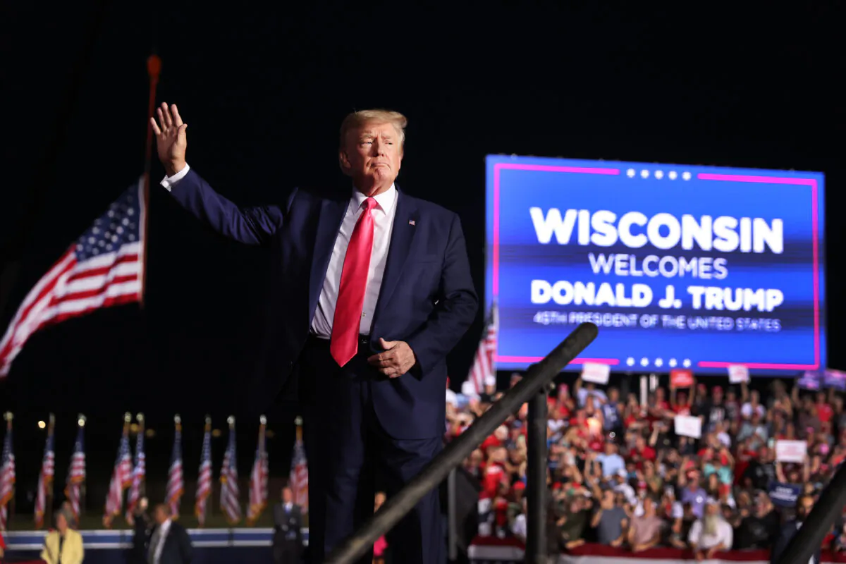 Former President Donald Trump greets supporters during a rally in Waukesha, Wisc., on Aug. 5, 2022. (Scott Olson/Getty Images)