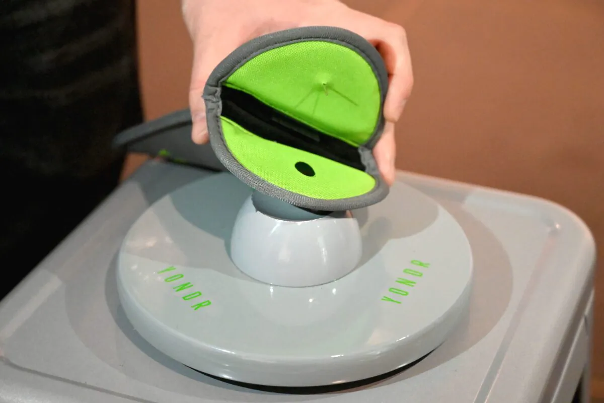 Mobile phones are locked into Yondr pouches before people enter an exhibition at the Brooklyn Museum on Nov. 22, 2019, in New York City. (Angela Weiss/AFP via Getty Images)