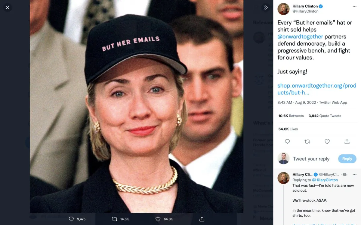 Hillary Clinton tweets a picture of herself in a "But Her Emails" hat just one day after the FBI raids former president Donald Trump's home for classified documents. Screenshot taken August 9, 2022. (Jackson Elliott/The Epoch Times) 