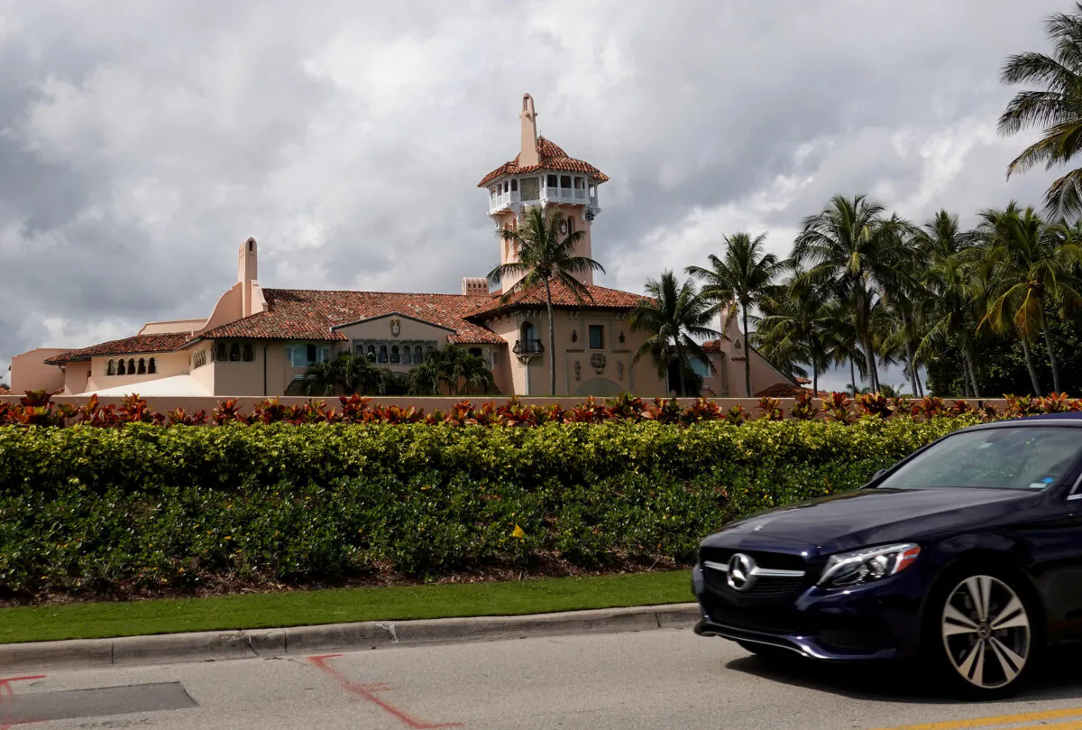 A car passes in front of former President Donald Trump's Mar-a-Lago resort in Palm Beach, Fla., in a Feb. 11, 2022, file photograph. (Joe Raedle/Getty Images)