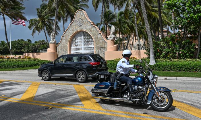 Local law enforcement officers in front of the home of former U.S. President Donald Trump at Mar-a-Lago in Palm Beach, Fla., on Aug. 9, 2022. (Giorgio Viera/AFP via Getty Images)