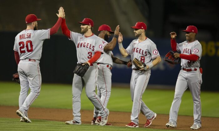 Los Angeles Angels players celebrate their 1-0 victory over the Oakland Athletics at RingCentral Coliseum in Oakland, on August 8, 2022. (D. Ross Cameron/USA Today)