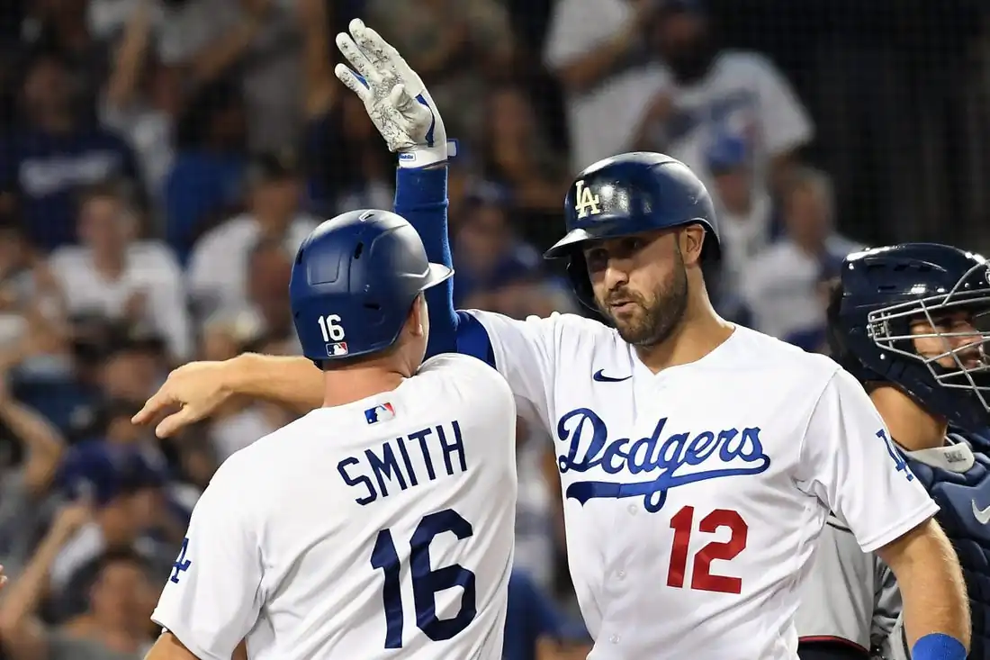 Los Angeles Dodgers right fielder Joey Gallo (12) celebrates with catcher Will Smith (16) after hitting a three run home run in the seventh inning against the Minnesota Twins at Dodger Stadium in Los Angeles, Aug. 10, 2022. (Richard Mackson/USA TODAY Sports via Field Level Media)