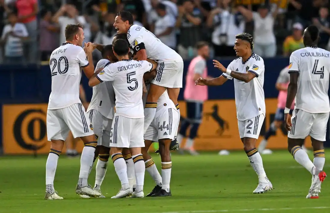 Los Angeles Galaxy celebrate a goal by midfielder Victor Vazquez (7) in the first half against the Vancouver Whitecaps at Dignity Health Sports Park in Carson, Calif., on Aug 13, 2022. (Jayne Kamin-Oncea/USA TODAY Sports via Field Level Media)