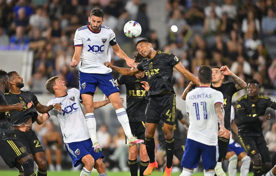 LAFC defender Eddie Segura (4) defends D.C. United defender Steve Birnbaum (15) on a pass from a free kick in the first half at Banc of California Stadium in Los Angeles, on Aug. 16, 2022. (Jayne Kamin-Oncea/USA TODAY Sports via Field Level Media)