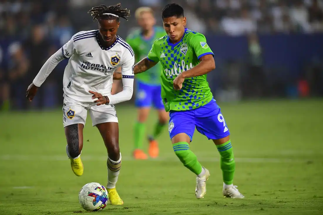 Los Angeles Galaxy forward Kevin Cabral (9) plays for the ball against Seattle Sounders forward Raul Ruidiaz (9) during the first half at Dignity Health Sports Park in Carson, Calif., Aug. 19, 2022. (Gary A. Vasquez/USA TODAY Sports via Field Level Media)