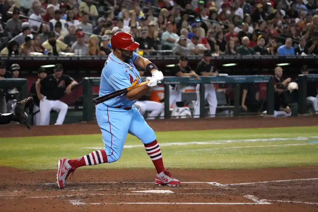 St. Louis Cardinals designated hitter Albert Pujols (5) hits a solo home run against the Arizona Diamondbacks during the fourth inning at Chase Field in Phoenix, Ariz., on Aug 20, 2022. (Joe Camporeale/USA TODAY Sports via Field Level Media)