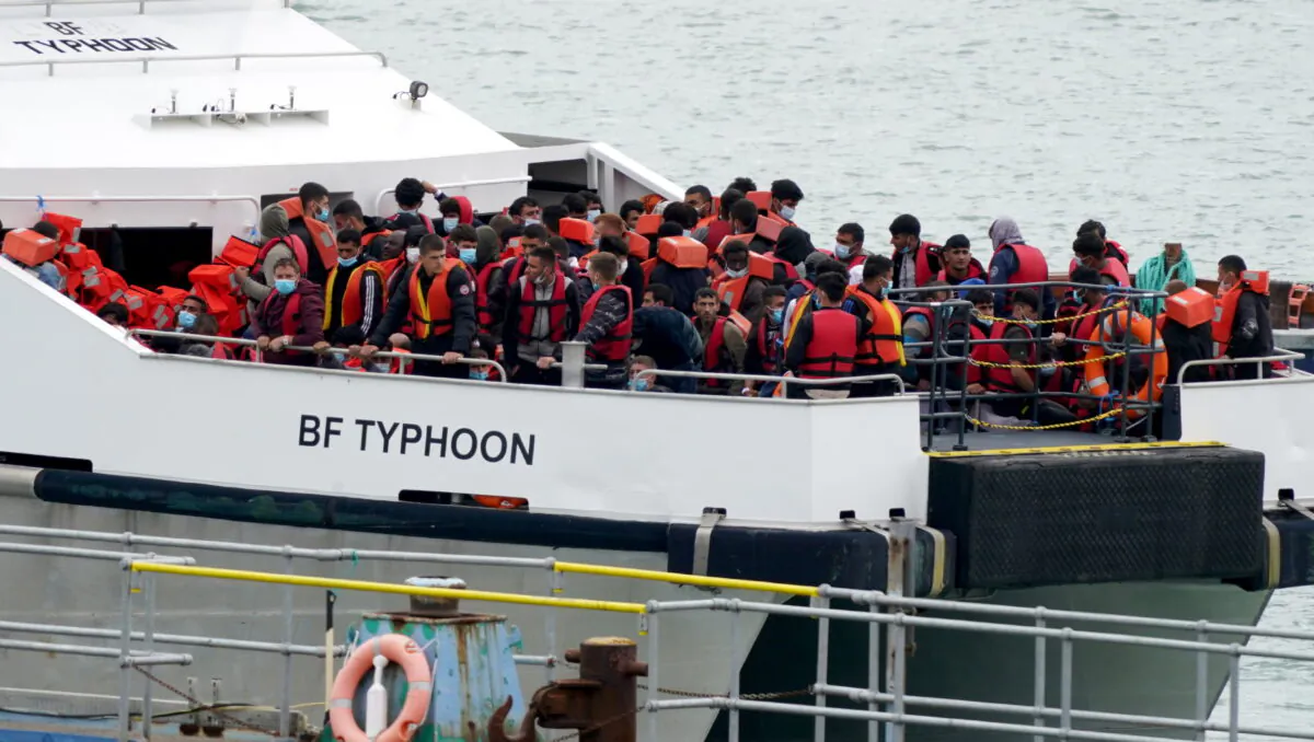 A group of people thought to be illegal immigrants are brought in to Ramsgate, Kent, England on Aug. 1, 2022. (Gareth Fuller/PA Media)