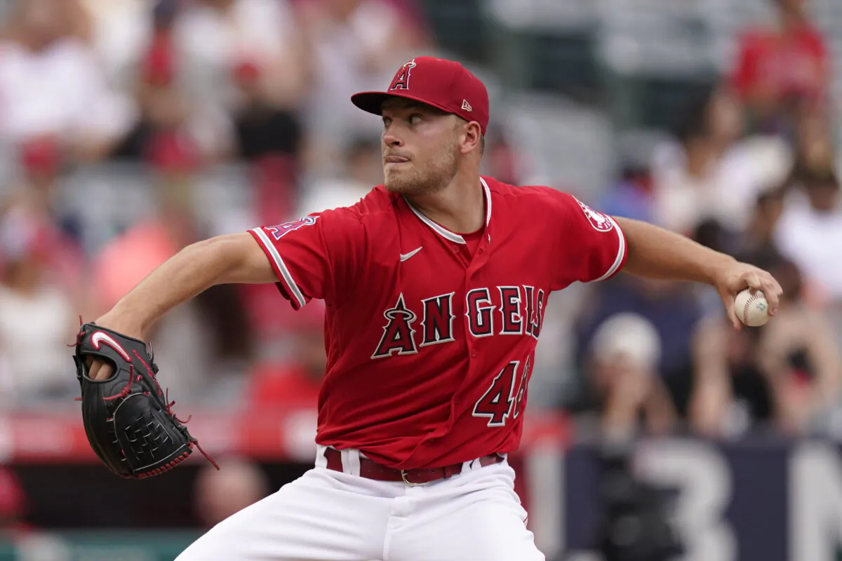 Los Angeles Angels starting pitcher Reid Detmers throws to the plate during the second inning of a baseball game against the Texas Rangers in Anaheim, Calif., Sunday, July 31, 2022. (AP Photo/Mark J. Terrill)
