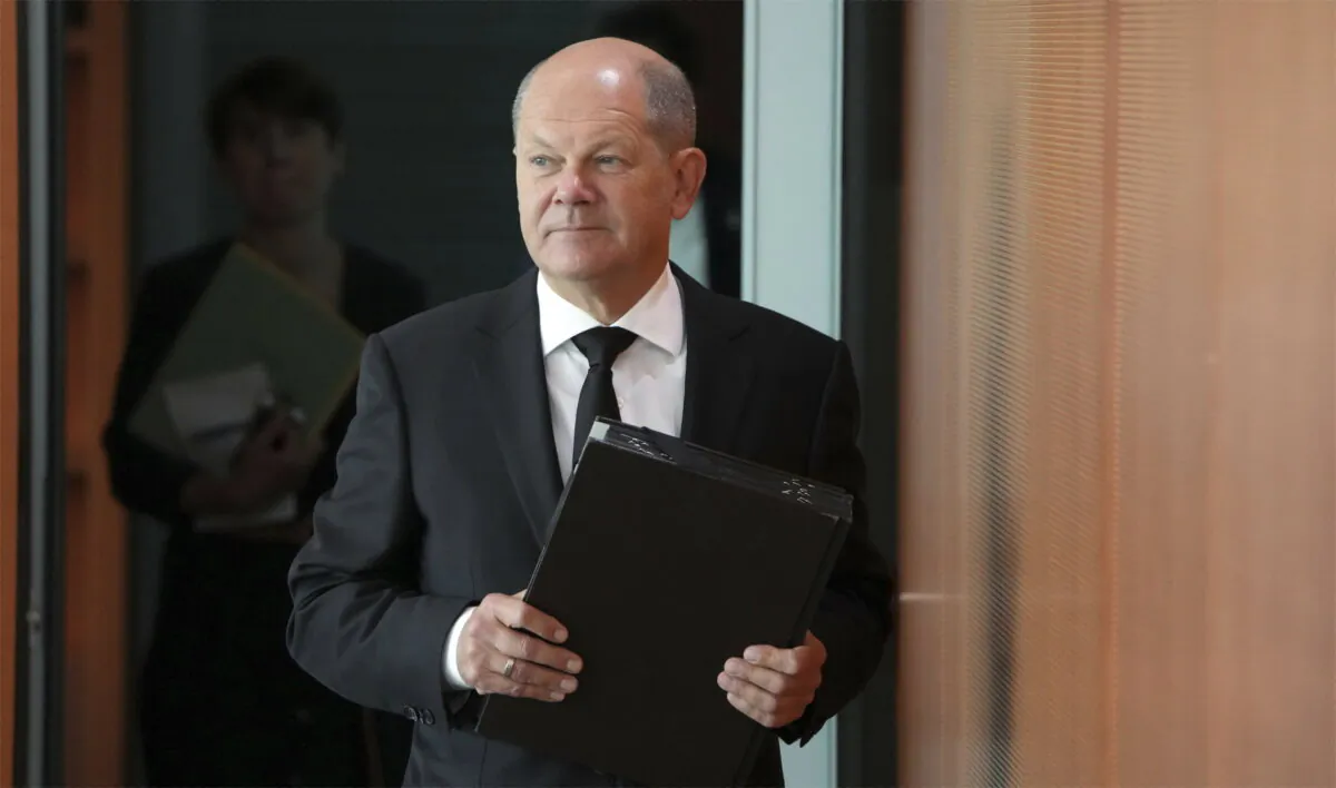 German Chancellor Olaf Scholz arrives for the weekly cabinet meeting at the chancellery in Berlin, Germany, on Aug. 10, 2022. (Michael Sohn/AP Photo)