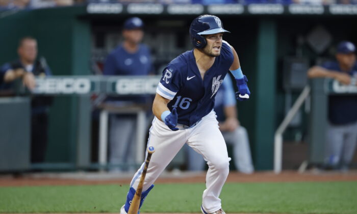 Kansas City Royals' Andrew Benintendi leaves the batter's box on an RBI single during the third inning of the team's baseball game against the Tampa Bay Rays in Kansas City, Mo., Friday, July 22, 2022. (Colin E. Braley/AP Photo)