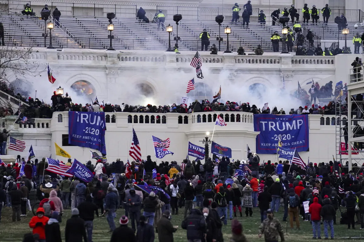People outside the U.S. Capitol on Jan. 6, 2021. (John Minchillo/AP Photo)