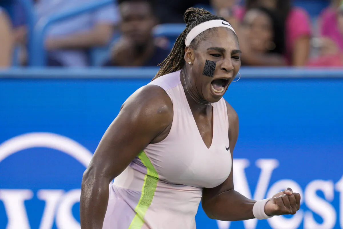 Serena Williams, of the United States, reacts after winning a point against Emma Raducanu, of Britain, during the Western & Southern Open tennis tournament in Mason, Ohio, on Aug. 16, 2022. (Jeff Dean/AP Photo)