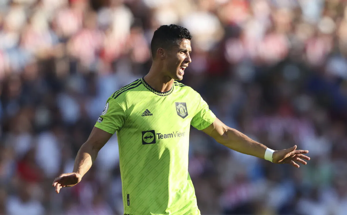 Manchester United's Cristiano Ronaldo reacts to his teammates during the English Premier League soccer match between Brentford and Manchester United at the Gtech Community Stadium in London on Aug. 13, 2022. (Ian Walton/AP Photo)
