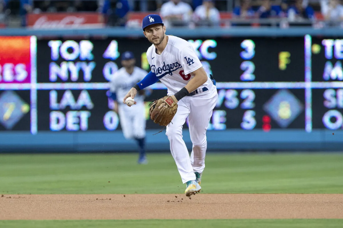 Los Angeles Dodgers shortstop Trea Turner prepares to throw out Miami Marlins' Jesus Aguilar during the first inning of a baseball game in Los Angeles, Aug. 19, 2022. (Alex Gallardo/AP Photo)