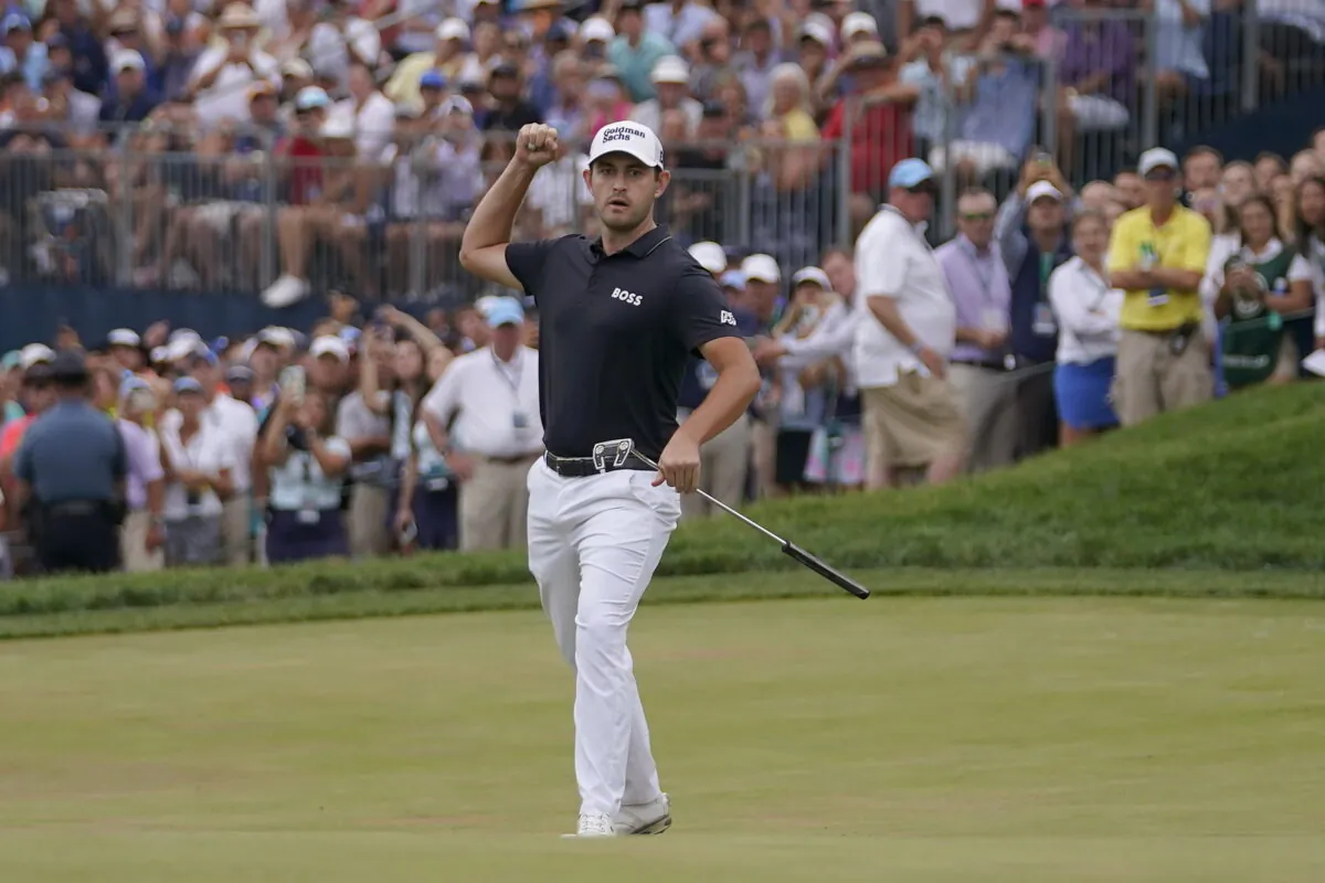 Patrick Cantlay reacts while watching his putt, which just missed, on the 18th hole during the final round of the BMW Championship golf tournament at Wilmington Country Club in Wilmington, Del., Aug. 21, 2022. (Julio Cortez/AP Photo)