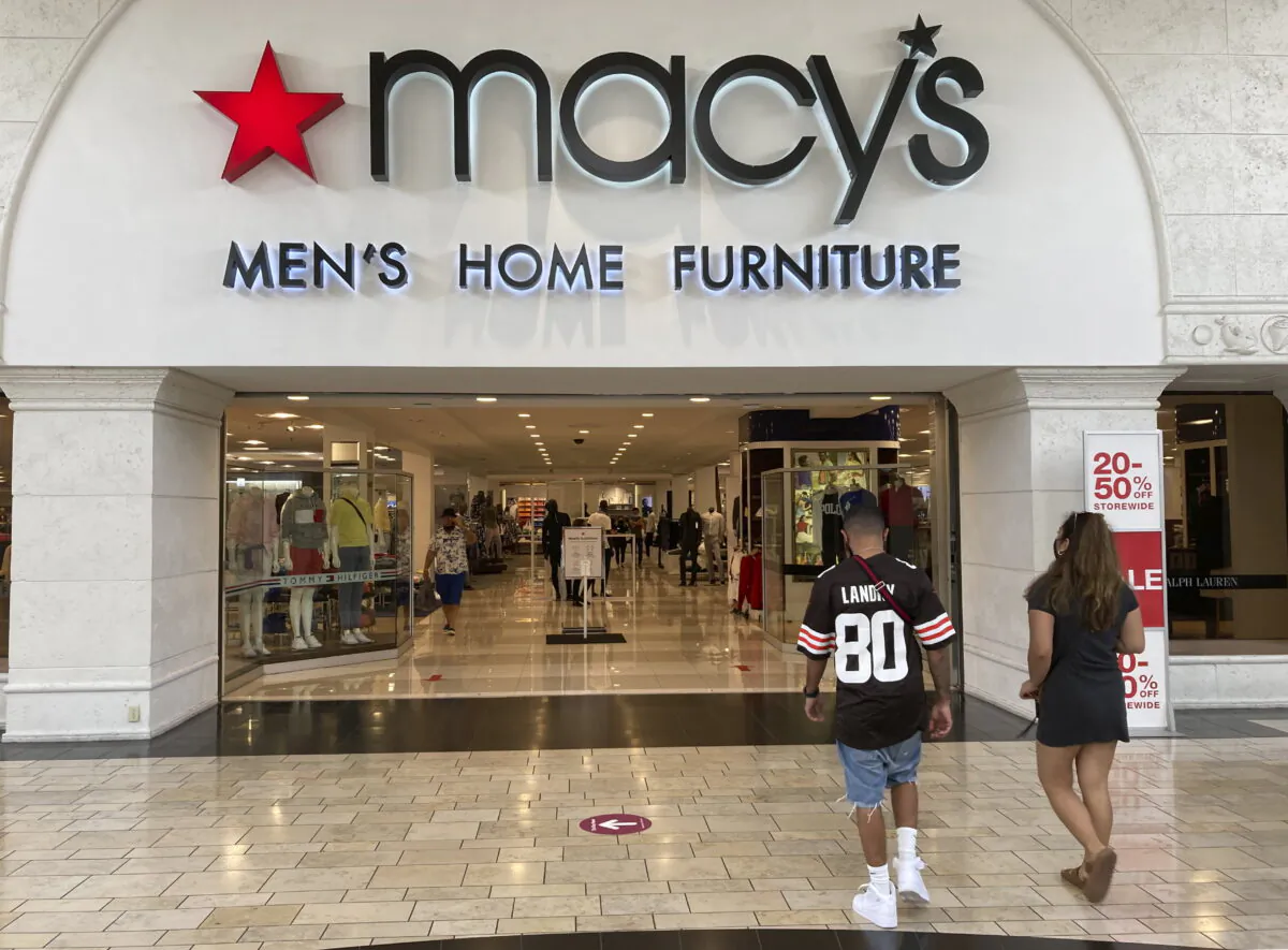 Shoppers walk into a Macy's department store at Miami International Mall in Doral, Fla. on Feb. 22, 2021. (Wilfredo Lee/AP Photo)