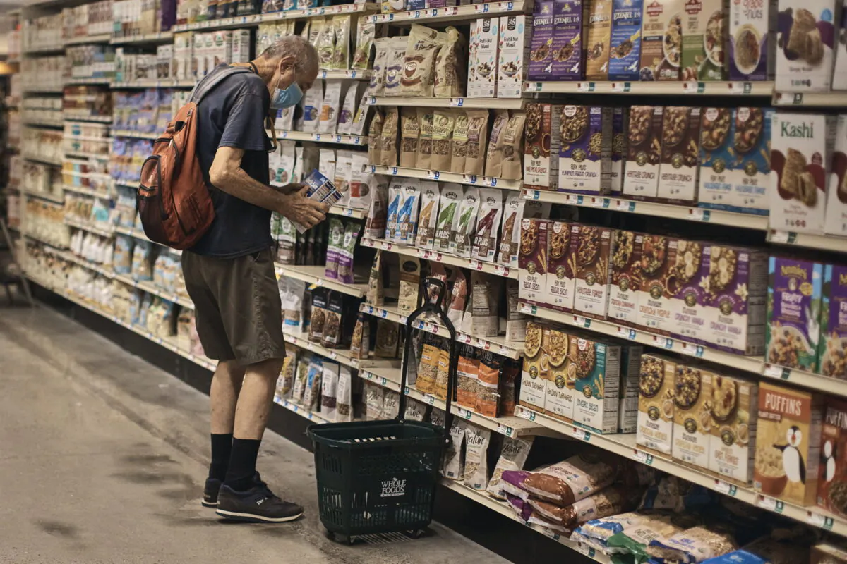 A man shops at a supermarket in New York, on July 27, 2022. (Andres Kudacki/AP Photo)