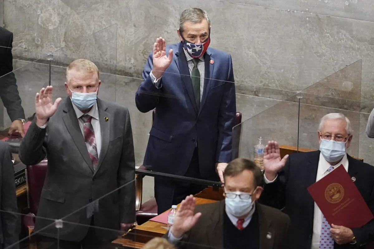 Rep. Glen Casada, R-Franklin, top center, is sworn in with other members on the first day of the legislative session in Nashville, Tenn., on Jan. 12, 2021. (Mark Humphrey/AP Photo)