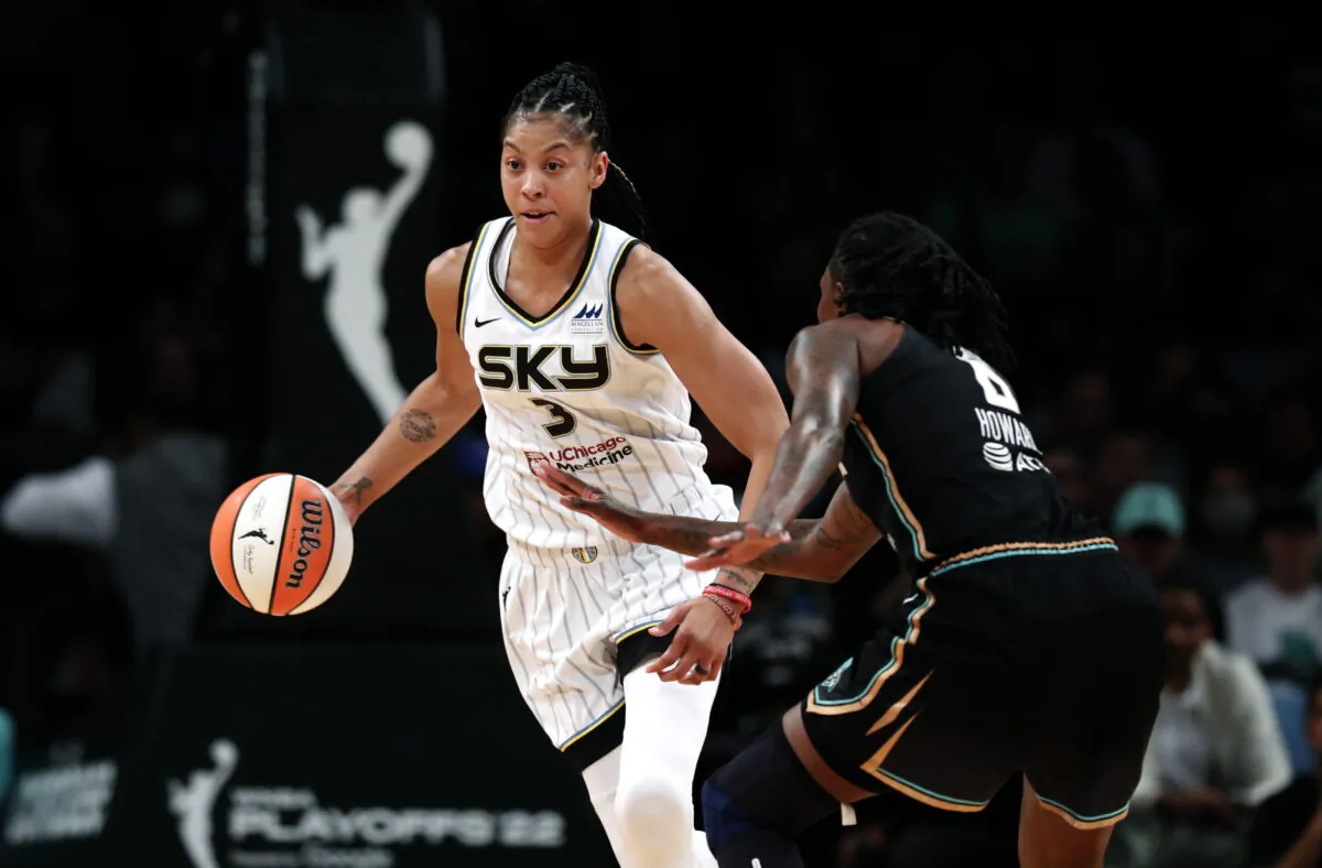 Chicago Sky forward Candace Parker (3) drives to the basket against New York Liberty forward Natasha Howard (6) during the first half of a WNBA basketball playoff game in New York on Aug. 23, 2022. (Noah K. Murray/AP Photo)