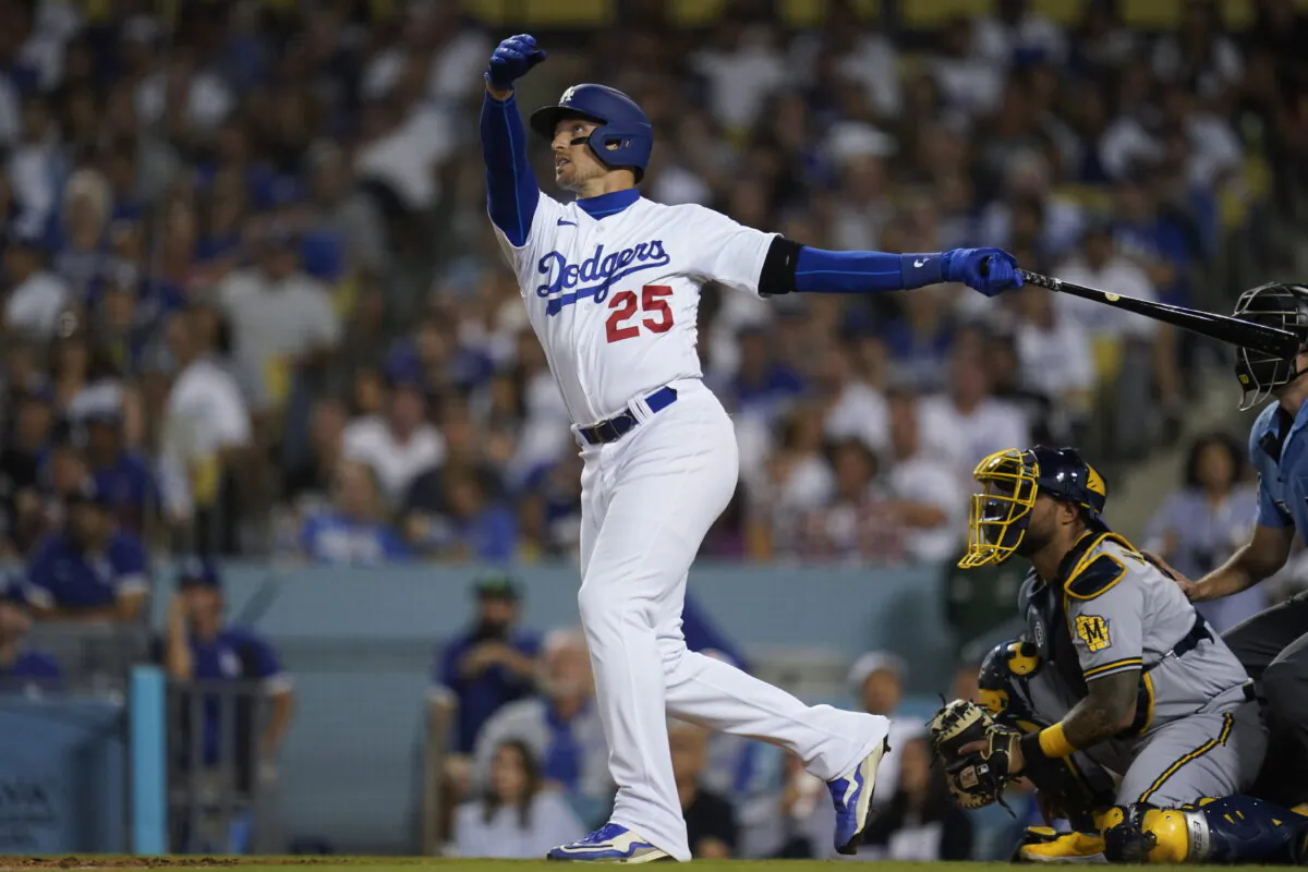 Los Angeles Dodgers designated hitter Trayce Thompson (25) hits a home run during the second inning of a baseball game against the Milwaukee Brewers in Los Angeles, Aug. 23, 2022. (Ashley Landis/AP Photo)