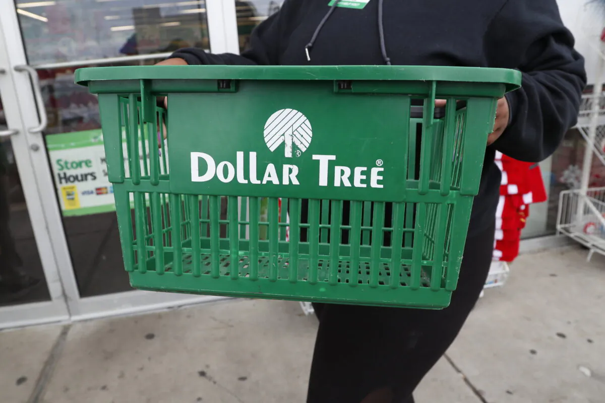 A clerk brings in a shopping basket at a Dollar Tree store in Richland, Miss., on Nov. 26, 2019. Dollar Tree and Dollar General both reported sales increases for the fiscal second quarter, on Aug. 25, 2022, as inflationary pressures draw low income shoppers to their stores for groceries and other necessities. Just like the last recession in 2008, dollar stores are again benefiting from shoppers focusing on low priced items and higher income shoppers trading down. (Rogelio V. Solis/AP Photo)