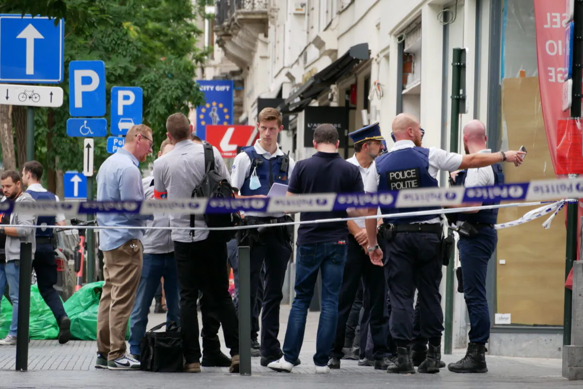 Police cordon off an area in the center of Brussels after an incident in which a van hit a terrace in Brussels on Aug. 26, 2022. (Sylvain Plazy/AP Photo)