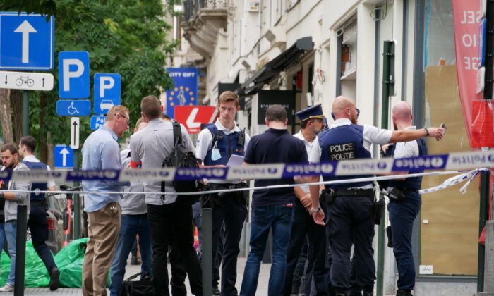 Police cordon off an area in the center of Brussels after an incident in which a van hit a terrace in Brussels on Aug. 26, 2022. (Sylvain Plazy/AP Photo)