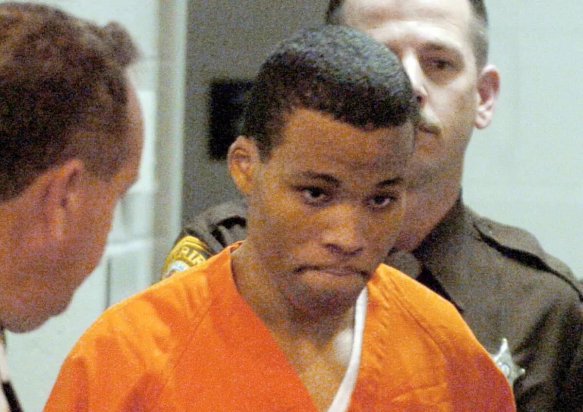 Lee Boyd Malvo enters a courtroom in the Spotsylvania Circuit Court in Spotsylvania, Va., on Oct.26, 2004. (Mike Morones/The Free Lance-Star via AP)